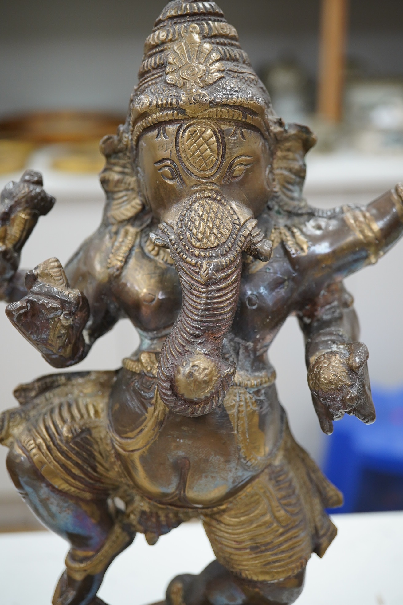 A gilt bronze statue of Ganesh, 30cm high. Condition - fair to good, general wear to the surface